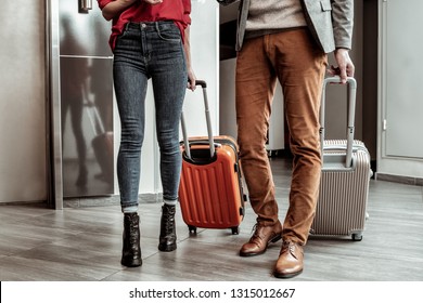 Stylish Details. Charming Girl Wearing High-heeled Shoes While Walking With Her Partner