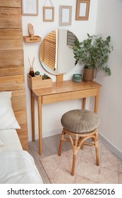 Stylish Dressing Table And Mirror Near White Wall Indoors. Interior Design