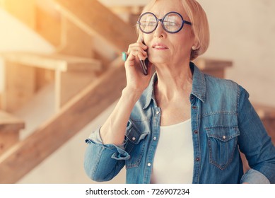 Stylish Elderly Woman Talking On Phone