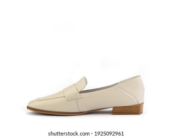 Stylish And Elegant Ivory Women's Loafers. Trendy Flat Leather Shoes With Square Toe And Beige Sole. Isolated Close-up On White Background. Left Side View. Fashion Shoes.