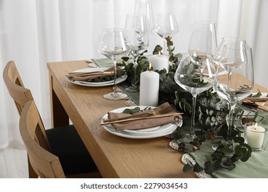 Stylish elegant table setting for festive dinner indoors