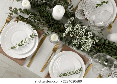 Stylish elegant table setting for festive dinner, flat lay - Powered by Shutterstock