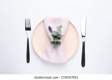 Stylish elegant table setting on white background, top view