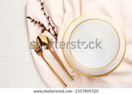 Stylish elegant table setting on wooden background, top view