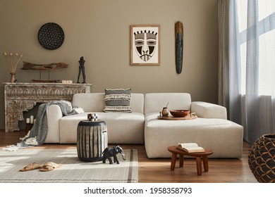 Stylish ethnic living room interior with design modular sofa, wooden stool, moroccan shelf, carpet decor, a lof of decoration and elegant personal accessories. in modern decor. Template. - Shutterstock ID 1958358793