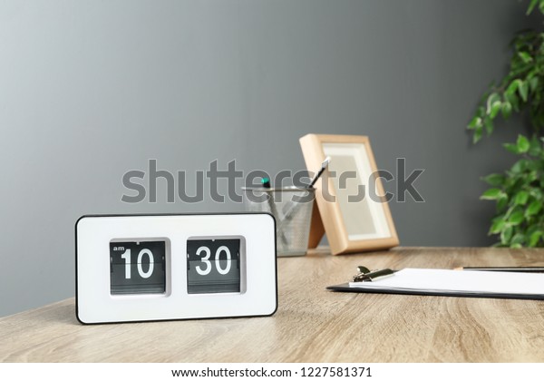 Stylish Flip Clock On Table Office Stock Photo Edit Now 1227581371