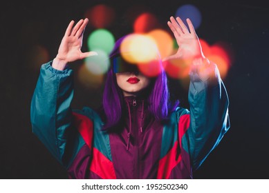 Stylish Girl In Cyber Punk Glasses And 80s Tracksuit On Dark Background