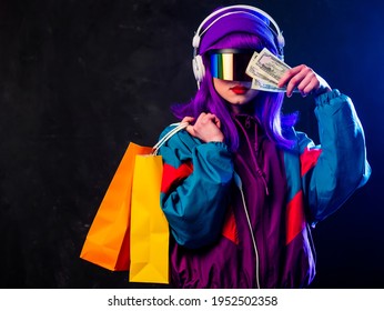 Stylish Girl In Cyber Punk Glasses And 80s Tracksuit With Shopping Bags And Money On Dark Background