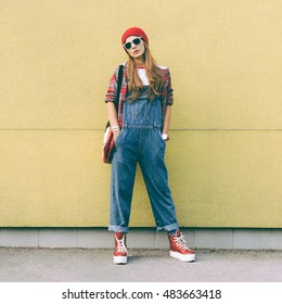 Stylish Girl In Denim Overalls And Accessories. Fall Fashion