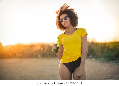 Stylish Girl Drinking A Beer