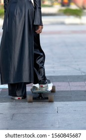 Stylish Girl Skater In Black Gothic Outfit And French Colonial Architecture In The Walking Street Of Ho Chi Minh City Vietnam