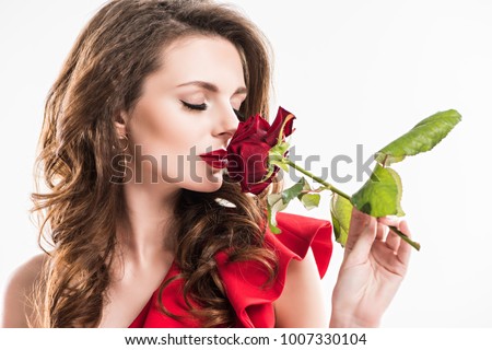 stylish girl sniffing rose closed eyes の写真素材 今すぐ編集