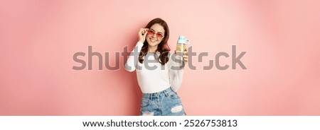 Similar – Image, Stock Photo Casual woman in sunglasses leaning against a brick wall