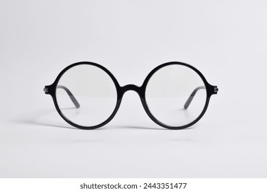 Stylish glasses with round black frames isolated on white background. anti-UV glasses - Powered by Shutterstock