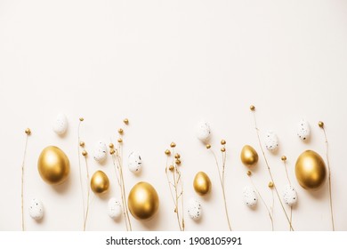 Stylish golden eggs easter concept. Easter gold eggs with golden dried flax linum bunch white background. Flat lay trendy easter. Happy easter card. Copy space for text - Shutterstock ID 1908105991