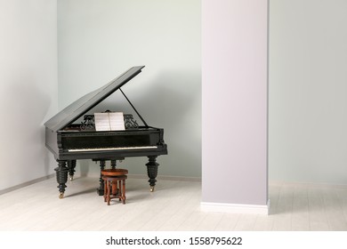 Stylish Grand Piano In Light Room