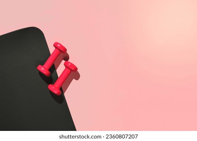 Stylish gray and pink fitness training and gym flat lay. Top view of gray sport mat and pink dumbbells on pink background. Set for pilates, fitness with copy space - Shutterstock ID 2360807207