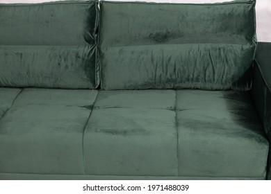 A Stylish Green Velvet Couch For A Modern Living Room Interior