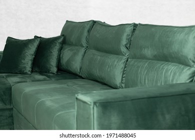 A Stylish Green Velvet Couch For A Modern Living Room Interior