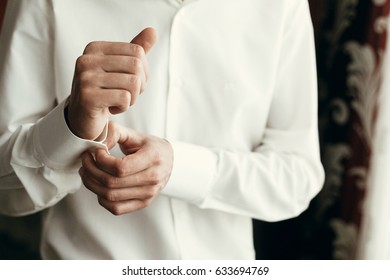 Stylish Groom Dressing Up, Getting Ready In Morning For Wedding Ceremony, Putting On Cuff Links