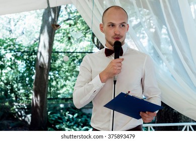 Stylish Handsome Emcee Performing Speech For Toast At Wedding Reception