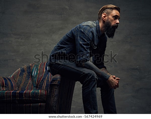 Stylish Hipster Male Posing On Chair Stock Photo (Edit Now) 567424969