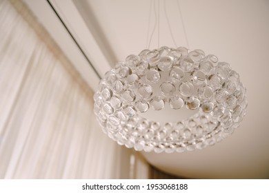 Stylish Hi-tech Chandelier Made Of Transparent Acrylic Balls. White Light Interior Style.