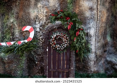 Stylish illuminated tree with warm golden lights, festive decor of street or square. Tree trunk and branches in golden lights bokeh in evening. Holiday winter fair. Merry Christmas, copy space - Powered by Shutterstock