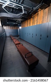 Stylish Indoor Fitness Club Locker Room. Empty Modern Dark Gym Locker Room.