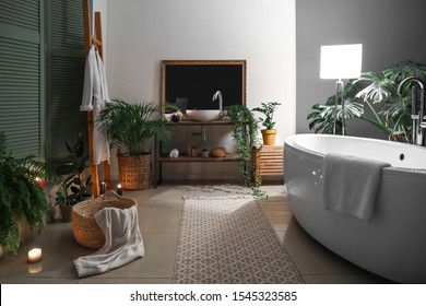 Stylish Interior Of Bathroom At Night