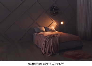 Stylish Interior Of Bedroom At Night