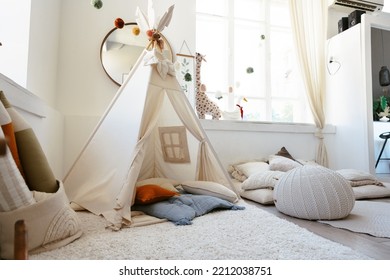 Stylish interior of children's room with hut