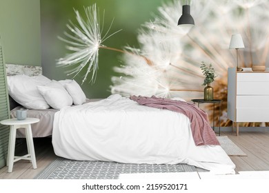 Stylish interior of cozy bedroom with printed blowball on wall