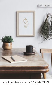  Stylish Interior Design Of Kitchen Space With Small Table With Mock Up Frame, Herbs, Cups Of Tea And Notebooks. Minimalistic Interior.