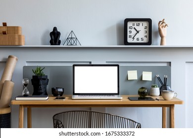 Stylish Interior Of Home Office Room With Mock Up Laptop Screen, Wooden Desk, Plant, Books, Notes, Chair, Wood Paneling And Elegant Office Accessories In Design Apartment.