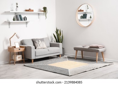 Stylish Interior Of Light Living Room With Sofa And Carpet