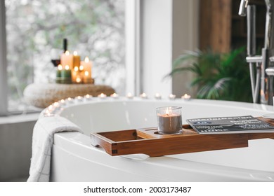 Stylish interior of modern bathroom with burning candles, closeup - Powered by Shutterstock