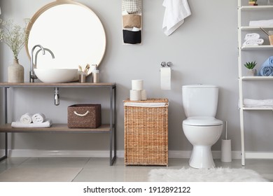 Stylish interior of modern bathroom with toilet bowl