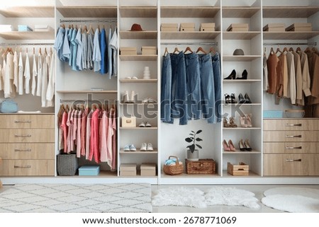 Stylish interior of modern clothes store