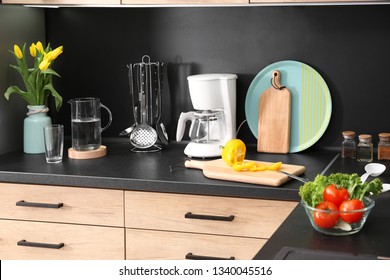 Stylish kitchen counter with houseware and products