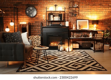 Stylish living room with beautiful fireplace, armchair and different decor at night. Interior design - Powered by Shutterstock