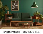 Stylish living room in house with modern retro interior design, velvet sofa, carpet on floor, brown wooden furniture, plants, poster mock up map, book, lamp and perosnal accessories in home decor.