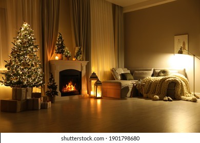 Stylish Living Room Interior With Beautiful Fireplace, Christmas Tree