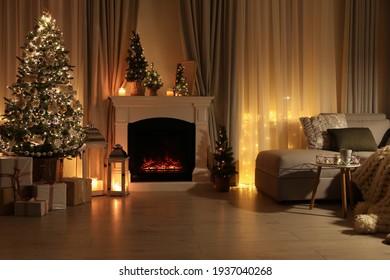 Stylish living room interior with beautiful fireplace, Christmas tree - Powered by Shutterstock