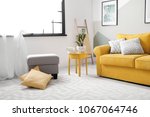 Stylish living room interior with comfortable sofa