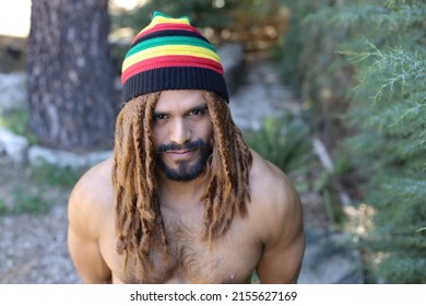 Stylish long haired man with dreadlocks - Powered by Shutterstock