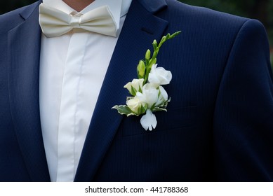 groom white bow tie