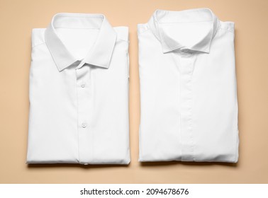 Stylish male shirts on color background - Shutterstock ID 2094678676