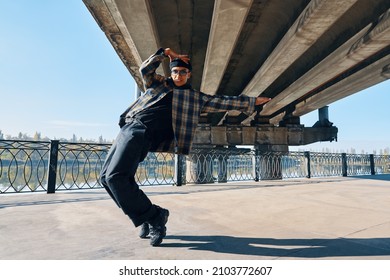 Stylish Man Dancing Hip-hop On The Street Urban Background. Youth Culture, Contemporary Dance