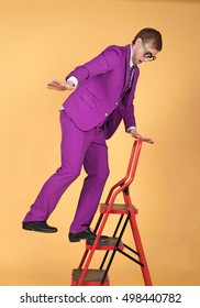 Stylish Man Falling Off A Ladder